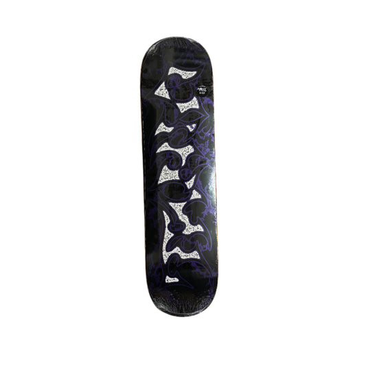Skateboard deck with a black and white pattern on a white surface