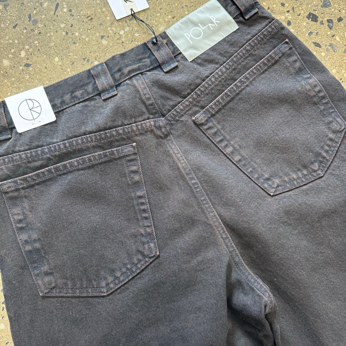 dark brown denim with navy blue tint