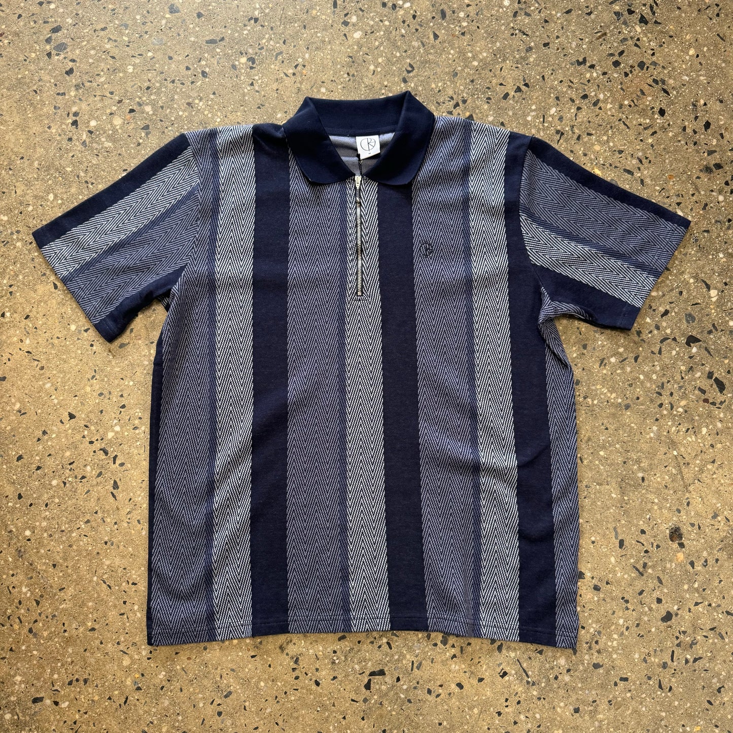 blue striped polo shirt