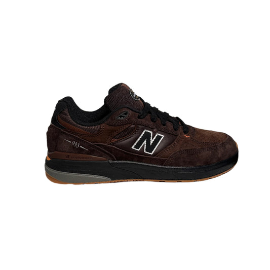 Brown New Balance sneaker on a white background
