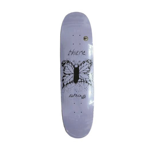 Skateboard deck with butterfly design on a white surface