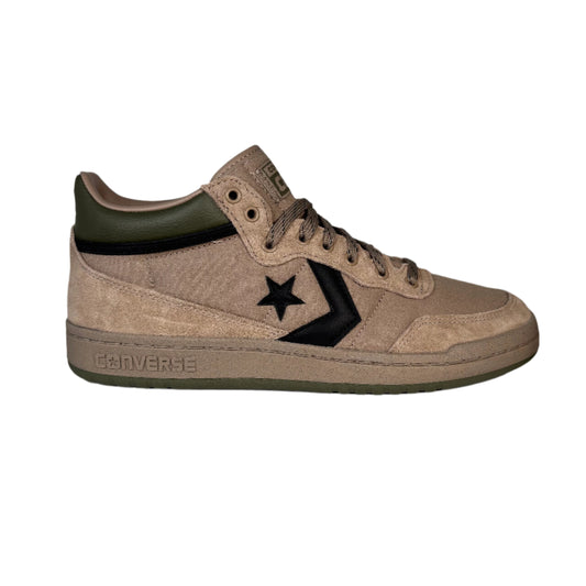 Beige Converse sneaker with black star logo on a white surface