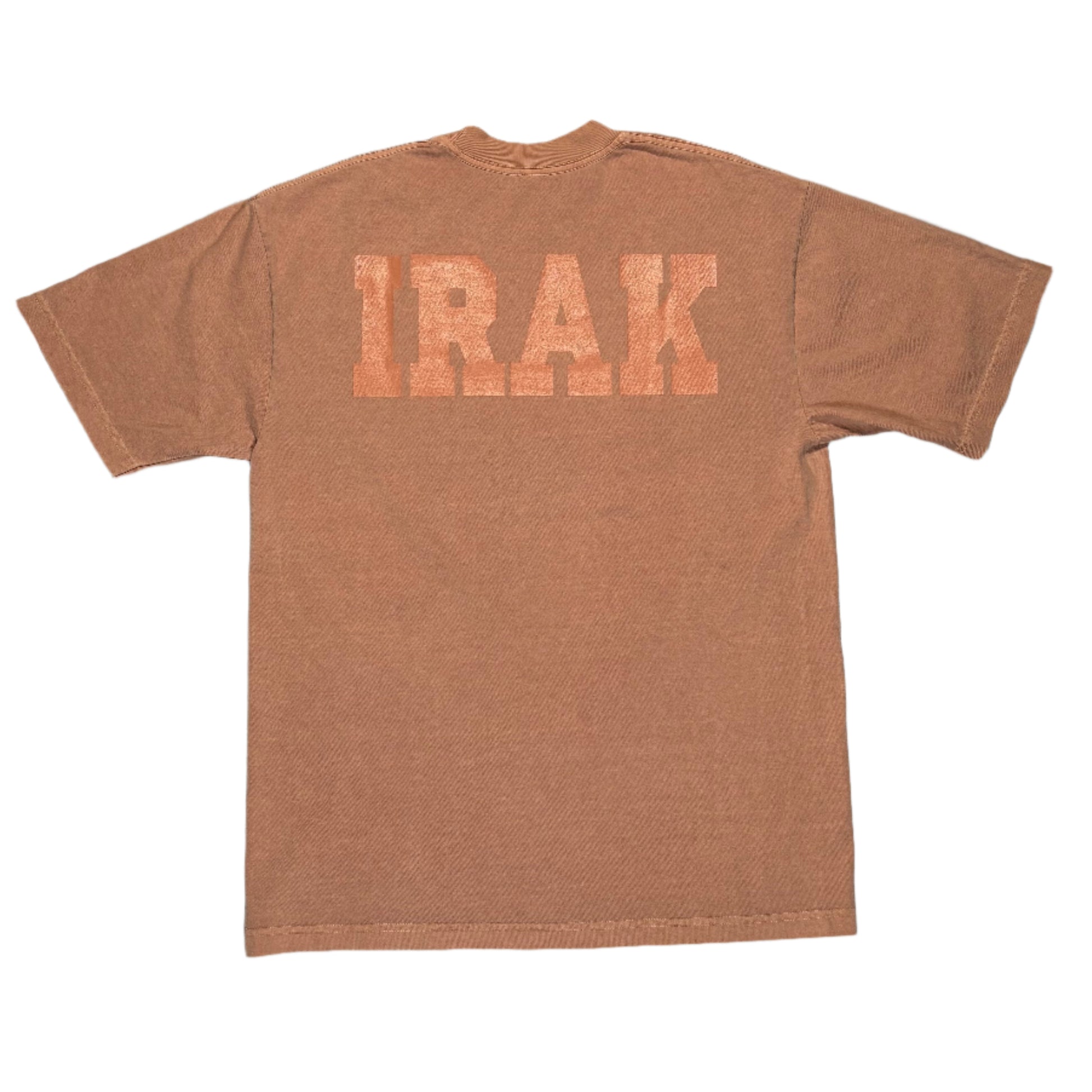 rose colored overdyed t-shirt with 'IRAK' printed on the back, laid flat on a white surface.