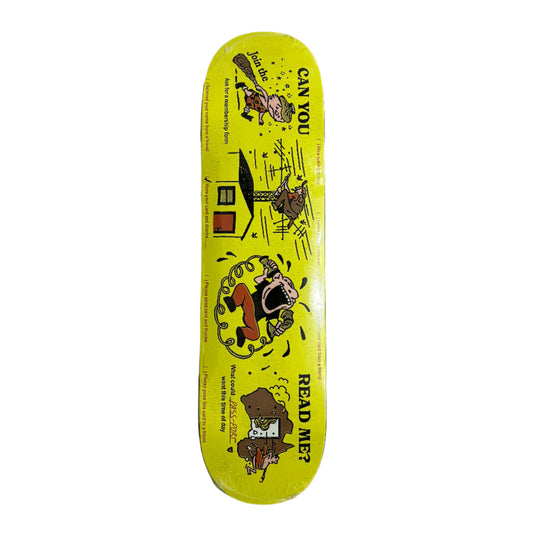Skateboard deck with cartoon character and text on a yellow background, placed on a white surface.