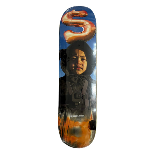 Skateboard deck with a graphic design on a white surface