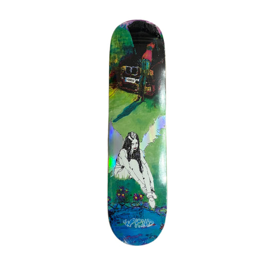 Colorful skateboard deck with artistic design on a white surface