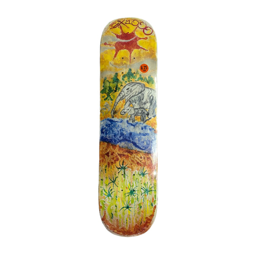 Skateboard deck with a colorful design of an elephant and landscape on a white background