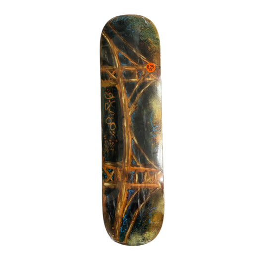 Skateboard deck with artistic design on a white background