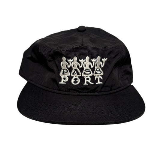 Black cap with white text on a light gray background