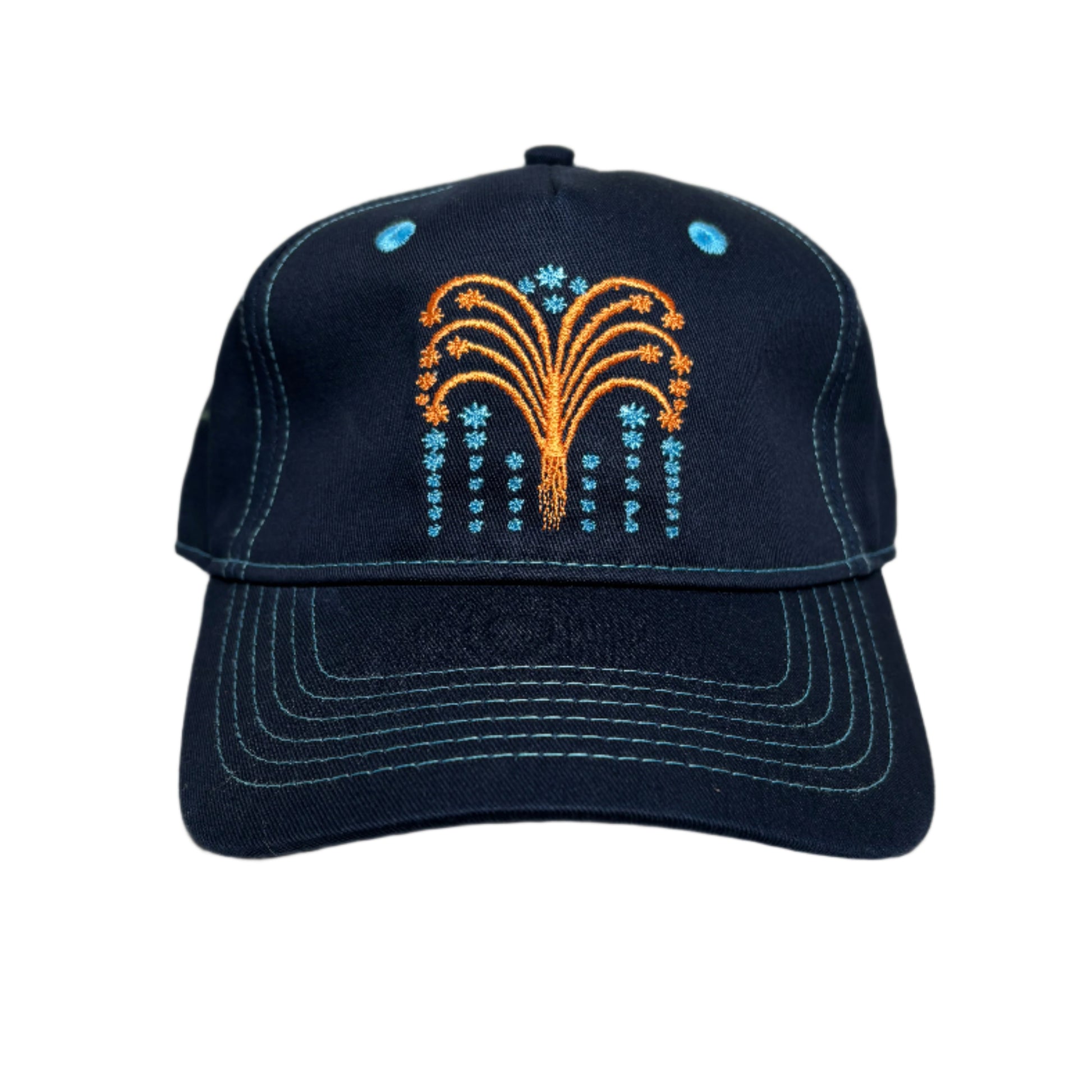 Navy blue cap with embroidered design on a white surface