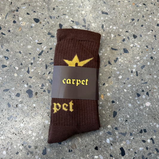 brown socks with yellow logo