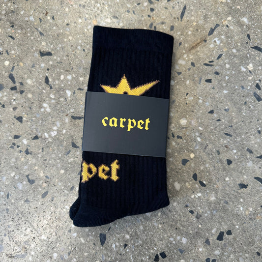 black socks with yellow logo