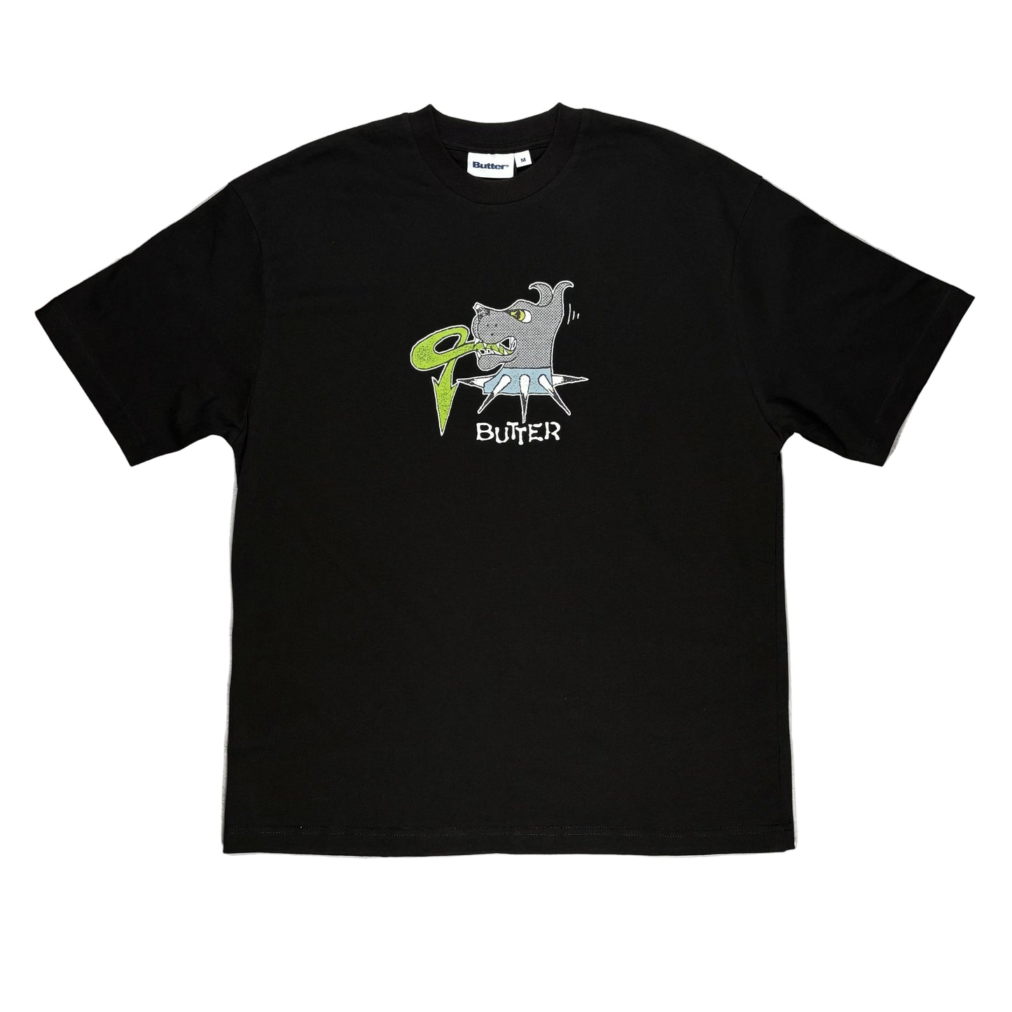 Black t-shirt with graphic design dog on a white surface