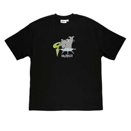 Black t-shirt with graphic design dog on a white surface