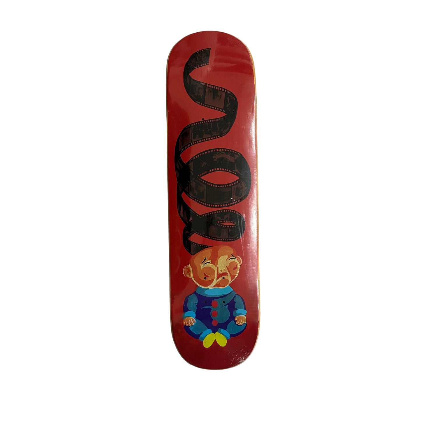 Skateboard deck with a cartoon character design on a white surface
