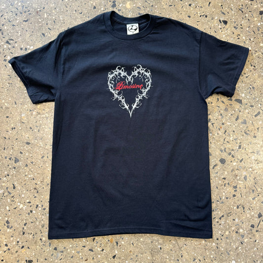 black t shirt with a heart in the center