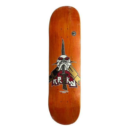 Skateboard deck with a skull and sword design on a white surface