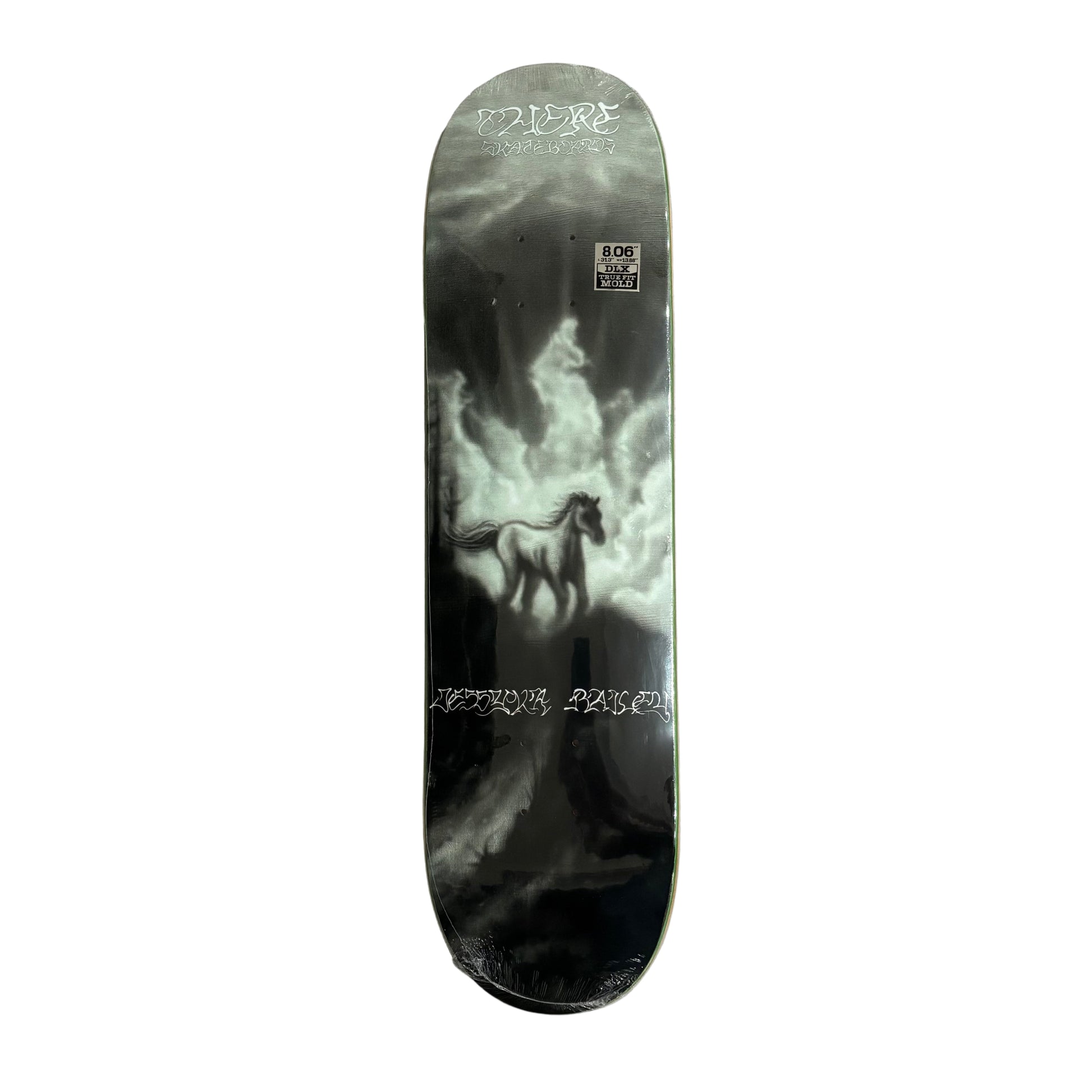 Skateboard deck with a black and white design on a white surface