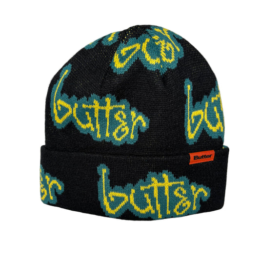 Black beanie with yellow and blue 'butter' branding on a white background