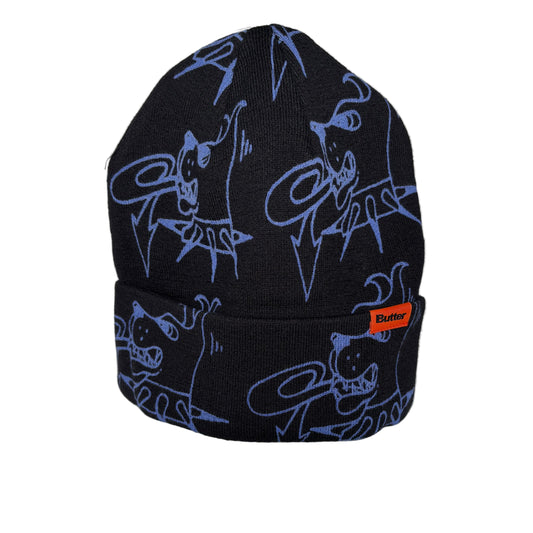 black cuff beanie with a dog print repeated on beanie