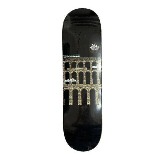 Skateboard deck with architectural design on a white surface