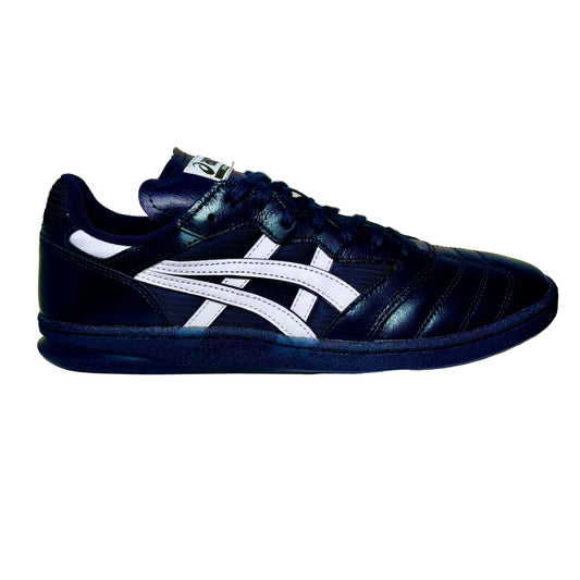 Navy and white sneakers on a white surface with a white background