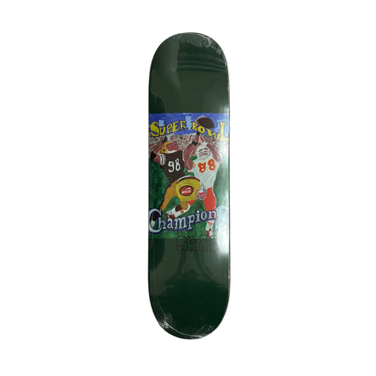 Skateboard deck with colorful graphics on a gray surface