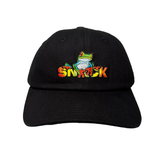 Black cap with colorful frog logo on a white surface