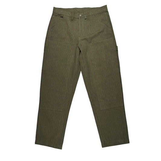 Green single knee rain camo pants on a white background