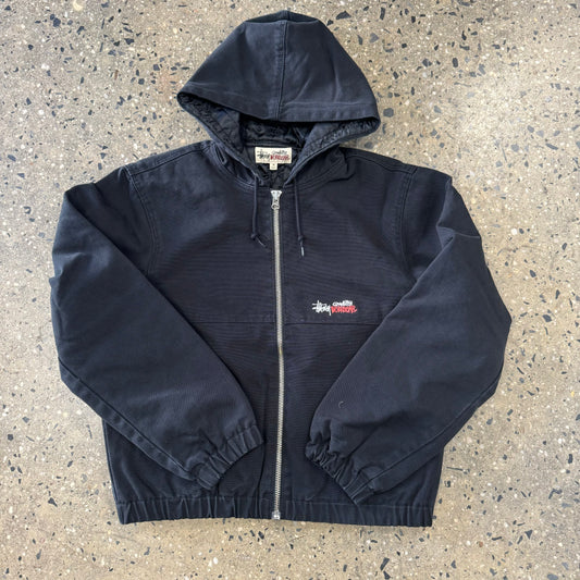 Front view of black hooded canvas stussy jacket