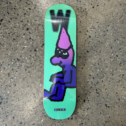 seafoam colored skatebord deck with a purple figure sitting down wearing a dunce cap