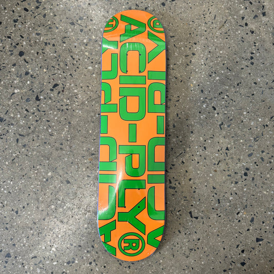 Orange skateboard with vertical green text across the bottom