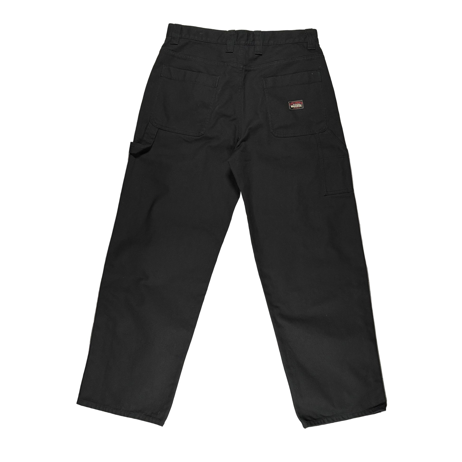 Black pants with a brand logo on a white surface