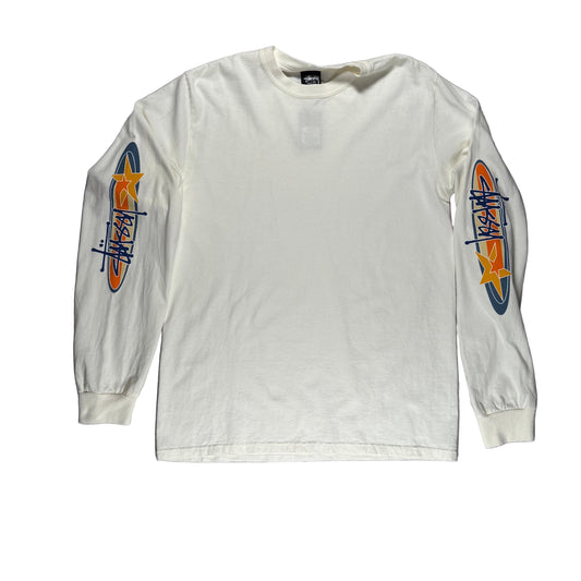 White long-sleeve shirt with stussy graphic designs on sleeves laid flat on a white surface.