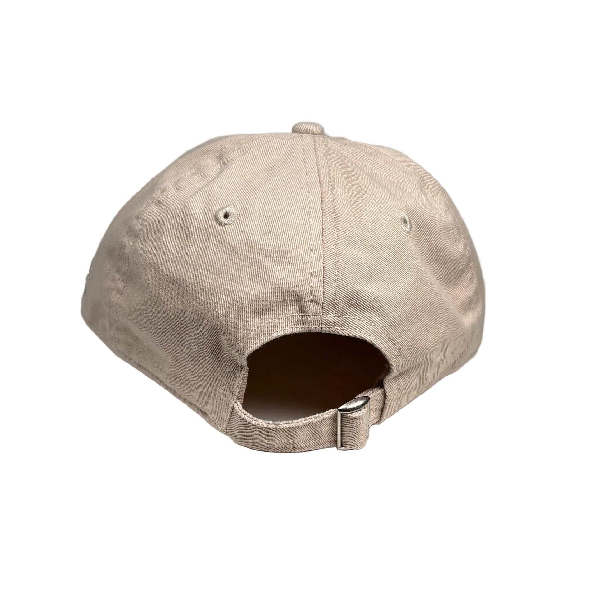 Beige baseball cap on a white  background