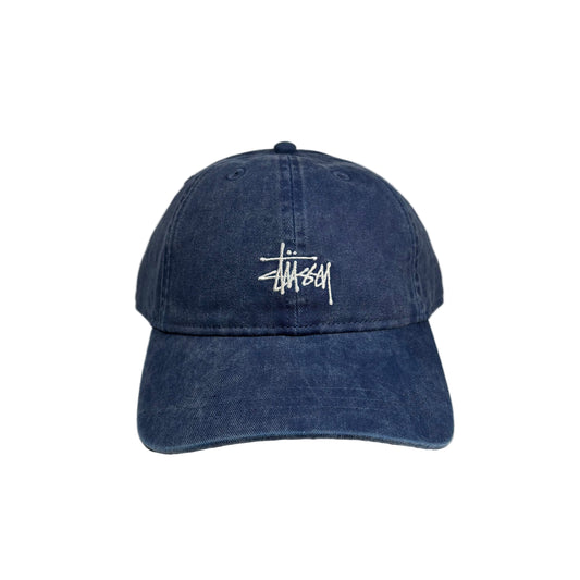 Blue cap with a white logo on a white background