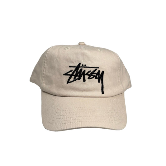Beige cap with black logo on a white  background