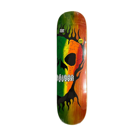 Colorful skateboard deck with a skull design on a white surface.