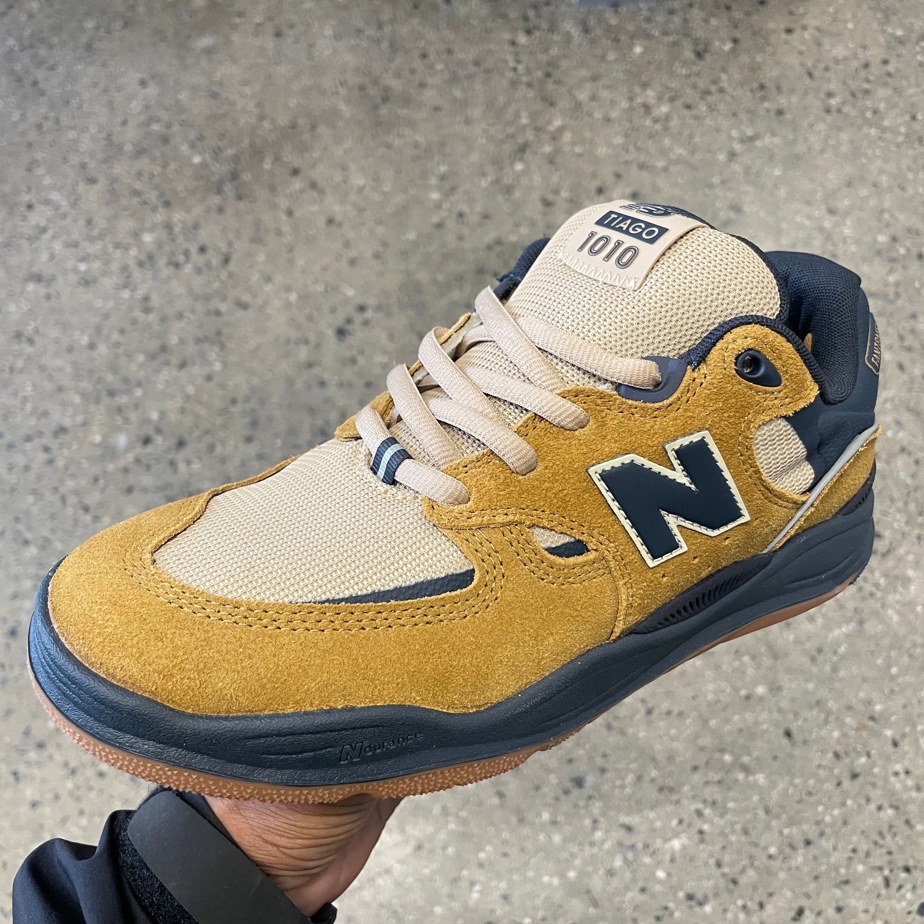 New balance blue best sale brown