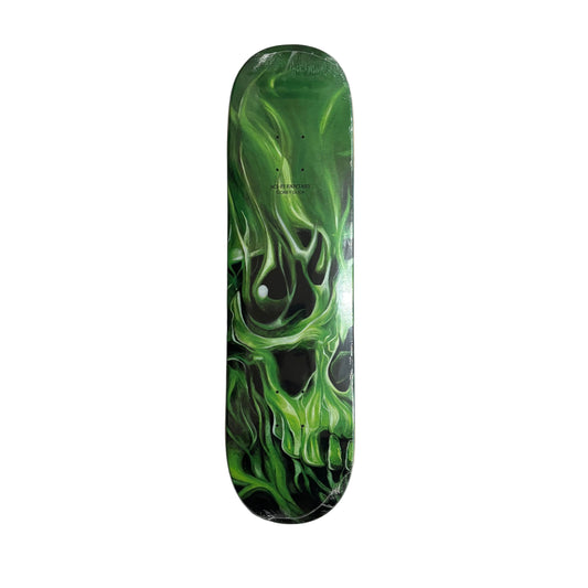 Skateboard deck with green flame design on a white surface