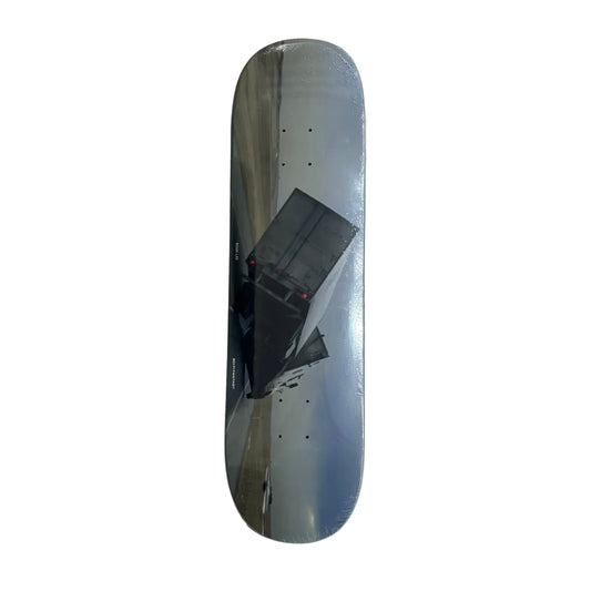 Skateboard deck with a design on a white surface