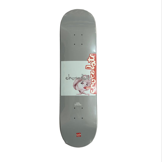 Skateboard deck with 'Chocolate' branding on a white surface