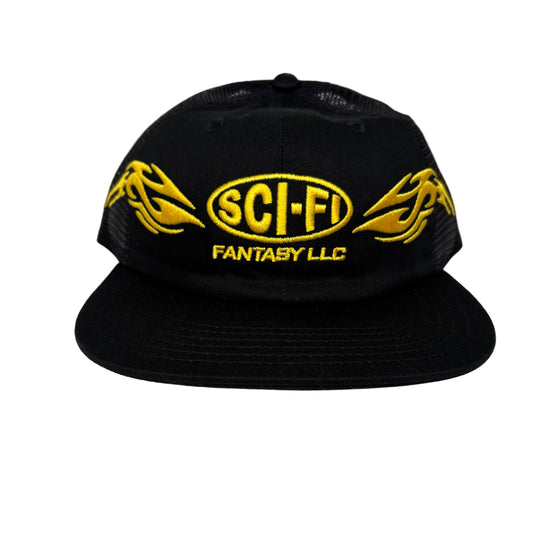 Black cap with yellow 'SCI-FI FANTASY LLC' logo on a white surface.