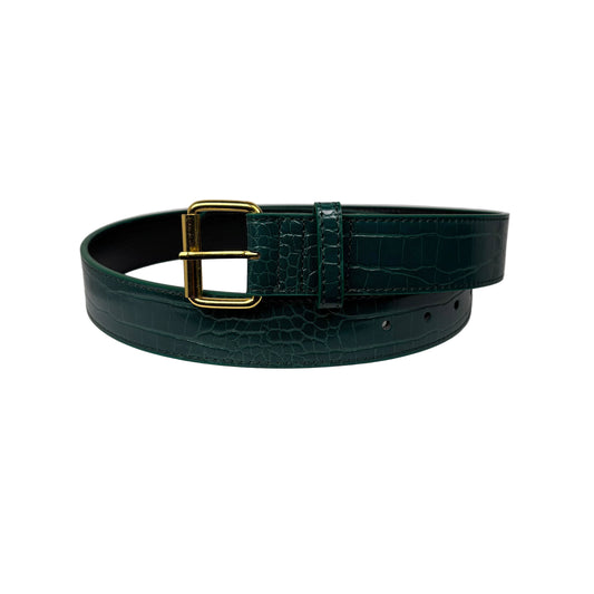Green faux croc skin belt with a gold buckle on a white surface against a white background