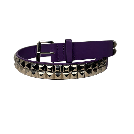 Purple belt with silver  studs on a white surface