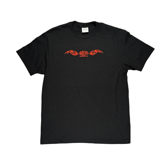 Black t-shirt with red logo on a white surface