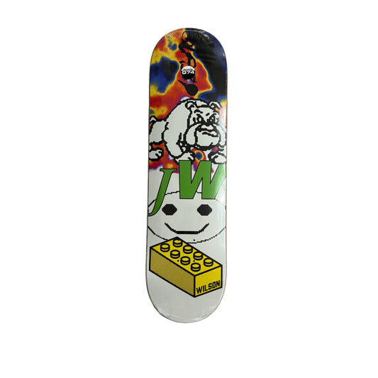 Skateboard deck with colorful design featuring a bulldog and 'JW Wilson' branding on a white surface.