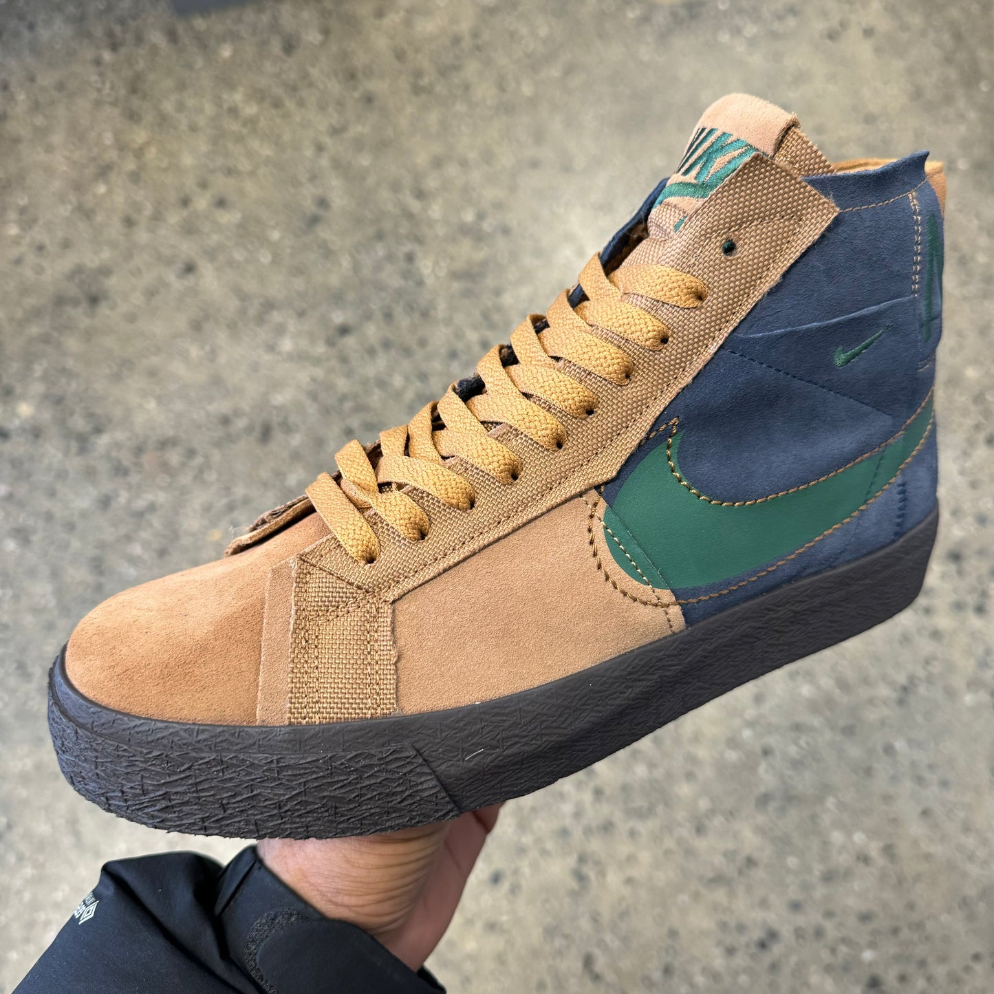 tan, green, and navy suede hi top sneaker with black sole