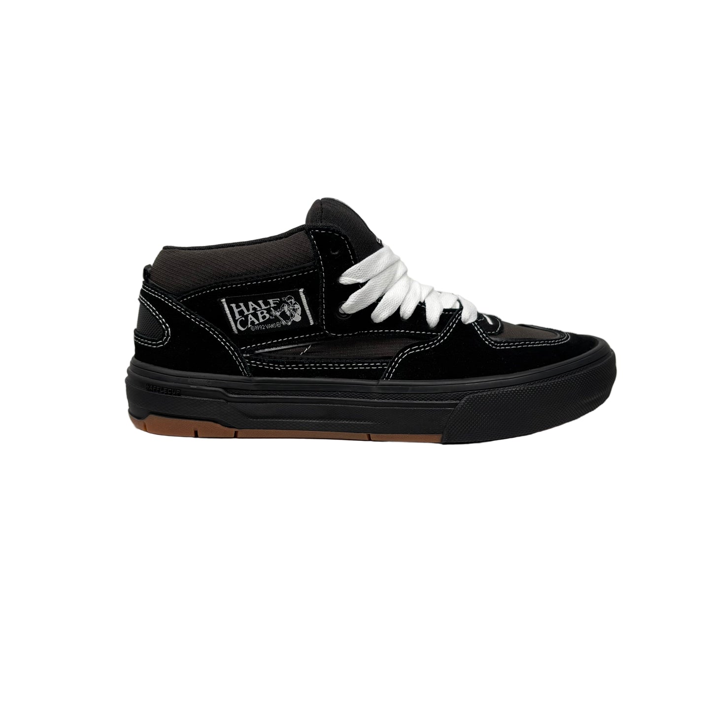 Black sneaker with white laces on a white background