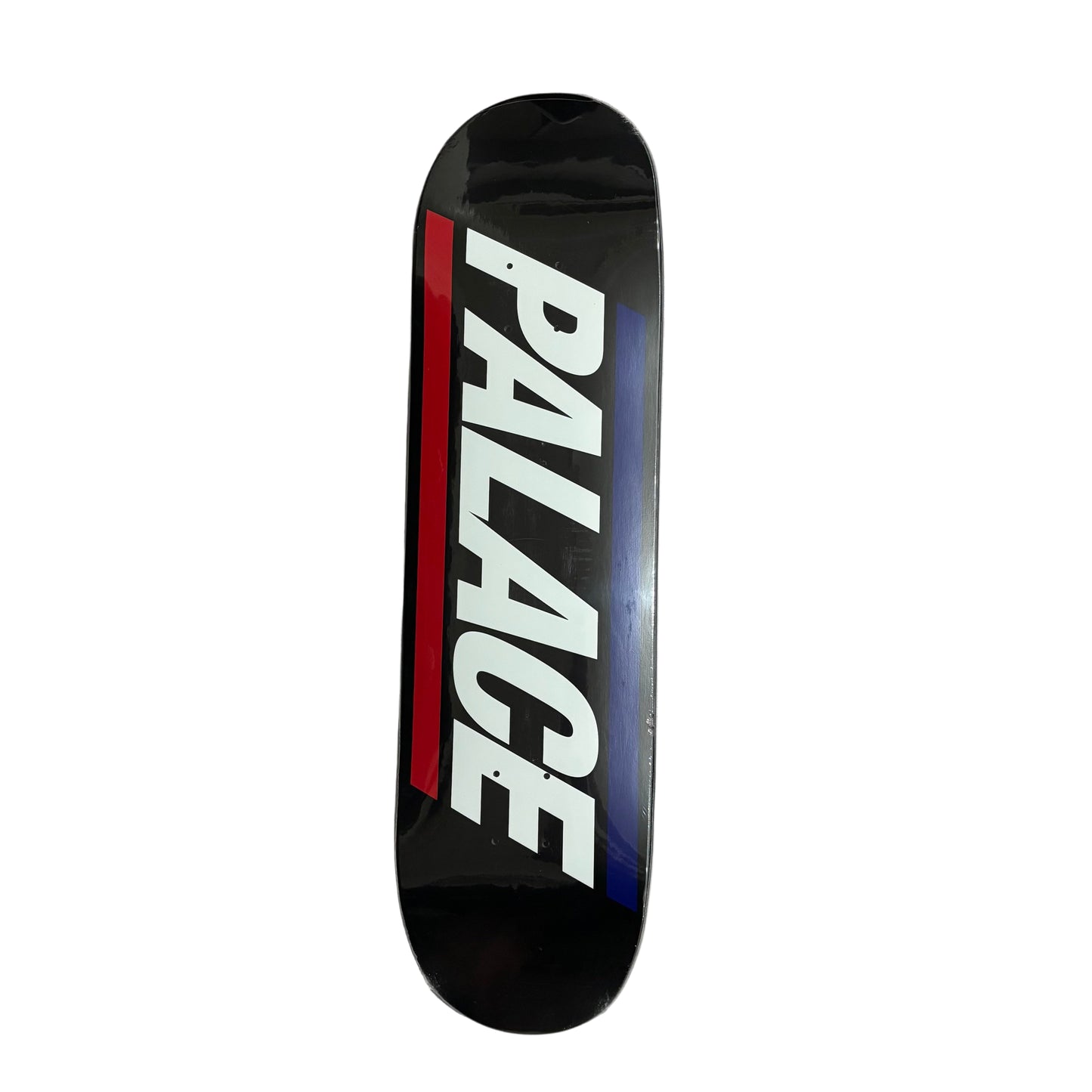 Skateboard deck with 'PALACE' logo on a white surface